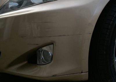Photo of car with a bumper scuff