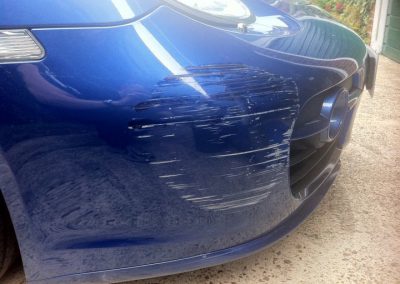 Image of badly scuffed bumper