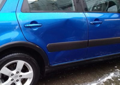 Image of a Car door requiring repair